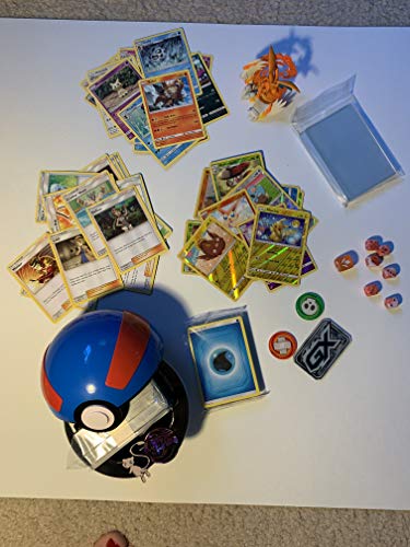 Poke Ball Bundle Starter Kit: Cards, Coin, Collectable Pin, and a Storage Ball and So Much More!